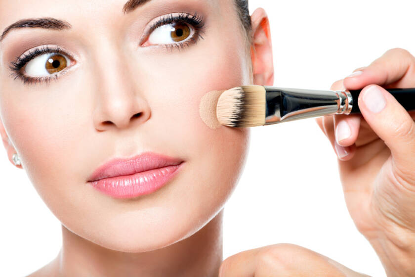 makeup-artist-applying-liquid-tonal-foundation-face-woman