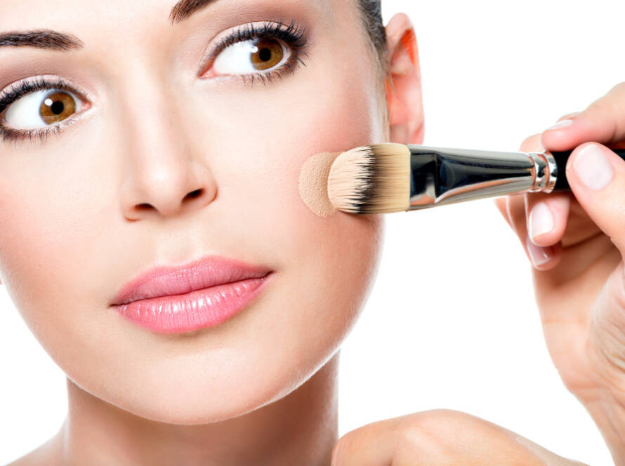 makeup-artist-applying-liquid-tonal-foundation-face-woman